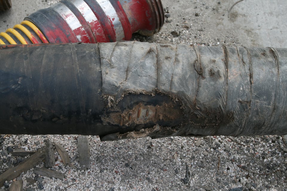Industrial hose with abraided and taped cover